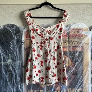 “Size 4” Reformation Jess mini dress in Jubilee print